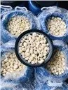ড্রামে ব্রিনে খোসা ছাড়ানো রসুন